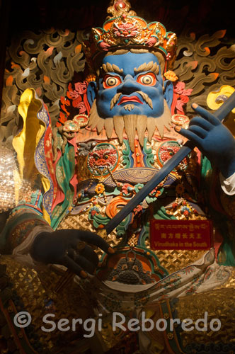 Virudhaka sculpture inside the Jokhang Temple. Virudhaka, guardian of the South is the Lord of the Kumbhandas, faced dwarf buffalo. He is the protector of the Buddha Ratnasambhava, born of a jewel.