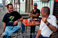 Three men take a delicious coffee in the central square of Filandia. Quindío. The ancient land of the Quimbayas opens to a geography of gently rolling hills, which are a permanent enjoyment for travelers who want coffee infinite landscapes. The architecture paisa of the population, with its balconies, its CASING contrasting colors, is one of its most beautiful features. The Spanish court's main square, is surrounded all the elements that make you feel is in the Coffee. The viewpoint of this town, festivals, friendly people, good coffee, are some of the reasons for good and go back to this wonderful town, it has had on several occasions the title of the most beautiful in Colombia.