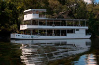 Cruise along the Victoria Falls aboard the " African Queen".  Other boats sailing in the Zambezi River. Sunset Cruise - This excursion is not for experiencing the falls, but instead is meant for wildlife viewing as well as for getting plastered at the open bar on board. In fact, this tour seemed to be immensely popular with the backpacker crowd probably because of copious amount of alcohol you could consume. It certainly seemed that for the tour we were on, a larger percentage of customers were more interested in the booze than the wildlife. I guess it became apparent why this tour's other nickname was the "booze cruise." Still, it's possible to enjoy the wildlife and the sunset in relative piece if you consciously avoid the backpackers looking to impress the opposite sex with their drunkeness. 