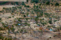 Aerial views of Mukuni village. Zambia. Mukuni, 9.6 km (6.0 mi) to the south-east of present day Livingstone, was the largest village in the area before Livingstone was founded. Its Baleya inhabitants, originally from the Rozwi culture in Zimbabwe, were conquered by Chief Mukuni who came from the Congo in the 18th century. Another group of Baleya under Chief Sekute lived near the river west of the town. The most numerous people in the area, though, were the Batoka under Chief Musokotwane based at Senkobo, 30 km (19 mi) north. These are southern Tonga people but are culturally and linguistically similar to the Baleya and grouped with them as the 'Tokaleya'. The Tokaleya paid tribute to the Lozi of Barotseland but in 1838 the Kololo, a Sotho tribe from South Africa displaced by Zulu wars, migrated north and conquered the Lozi. The Kololo placed chiefs of their subordinate Subiya people of Sesheke over the Tokaleya. 