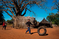 Landscape of Mukuni Village.  Chief Makuni invites visitors to his village, home to the Leya people. This is a unique opportunity to see how the local people live in a working village, not one built for tourists. Approximately 6000 people live here and a visit is a fascinating insight into their life style. A member of the village shows visitors around and they can see how traditional huts are built and decorated, take a look inside, meet the residents and see the locals at work. It is found in family management level but is well balanced in rural power sharing. In this culture, it is the women who decide and manage the cultural issues including land allocation whereas men carry management of the day to day running of the village. 