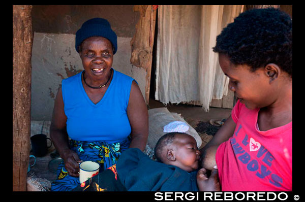 A woman breastfeeding her son in Mukuni Village. Zambia. Zambia launches campaign to promote exclusive breastfeeding. At the launch of the Government of Zambia’s new advocacy campaign for infant and young child feeding, the country’s Minister of Health had a clear message for every mother: Exclusively breastfeed your newborn for the child’s first six months of life. “Exclusive breastfeeding means giving the baby only breast milk for the first six months, and no other liquids or solids, not even water unless medically indicated,” said Minister of Health Kapembwa Simbao. “It is therefore crucial that breastfeeding our children becomes the norm in Zambia, because breast milk plays a very important role in securing the health of children and is essential for overall child survival.” To help improve the nutritional status of every Zambian child, the ministry’s new advocacy campaign is emphasizing the importance of breastfeeding, starting within the first hour of birth and continuing exclusively for the first six months. The national campaign aims to increase the exclusive breastfeeding rate substantially. “This gathering today is a significant step in Zambia’s fight against malnutrition. The launch of the mass media campaign against malnutrition, with a focus on exclusive breastfeeding of children under six months of age, is commendable step by the government and partners to make a difference for these children and to save their lives,” said UNICEF Deputy Representative in Zambia Elspeth Erickson.