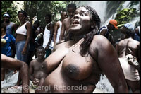 Thousands of Haitian pilgrims all over the country in the Voodoo Festival in Saut d 'Eau, a town about 150 kilometers north of Port au Prince, capital of Haiti.