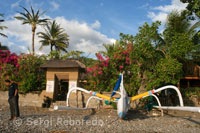 A boat rests on the sandy beach of Amed, a fisherman village of East Bali.