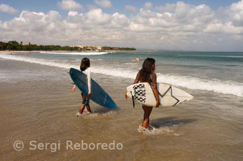 Kuta Beach is where surfing in Bali began. Imagine an absolutely perfect, white sand beach, palm trees coming down to the water's edge, and completely empty, roping A frames for as far as you could see. The first surfers to come to Bali were treated to an epic experience. These days a lot has changed in Kuta, and it is becoming a major tourist city. There are thousands of little restaurants, places to stay, and some of the best shopping anywhere in the world. The beach is full of people. People playing soccer, exercising, doing Tai Chi, selling everything from sarongs to sunglasses, renting surfboards or beach umbrellas, and, of course, surfing. The surf at Kuta Beach can be great. It's no wonder legendary Kuta local boys like Rizal Tanjung, Bol Adiputra, Pepin Hendrix, Wayan Pica, or Made Switra surf as well as they do, Kuta Beach is an ultra consistent, quality beachbreak, that is ideal for learning to surf and for honing one's skills. Kuta Beach is actually a long strip of different sand bar breaks that runs from Kuta Reef all the way down to Seminyak's Blue Ocean beach. This stretch of white sand peaks is best at high tide when the faster sections are more makeable and offer high performance surfers the chance to link several maneuvers on each wave. Places like Halfways in front of Jalan Padma are the training grounds for some of Bali's hottest surfers, and it's a treat to watch some of the smoothest surfing on the planet. 