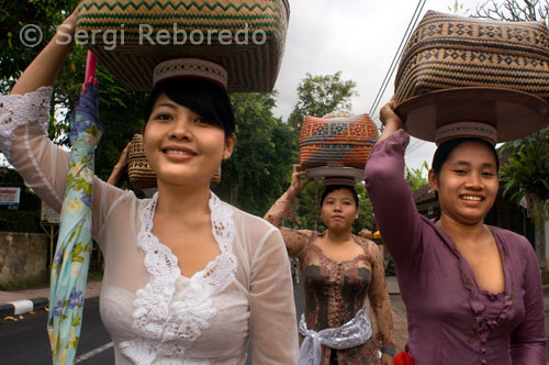 During the day of Penampahan Galungan animals are sacrificed (in particular pigs and chickens) as special offerings which are meant to get rid of negativity in both the bhuana agung (the environment of the individual human being) and the bhuana alit (the inner world of the individual human being); the meat is afterwards prepared and cooked for traditional Balinese dishes such as lawar, babi guling, and satay. Especially the Balinese children are looking forward to Penampahan Galungan as it is a typical family party day with lots of delicious dishes. The adults however are extremely busy during this day with the final preparations of the Galungan offerings. 