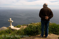 A cruceiro located on the back of the lighthouse Fisterra.