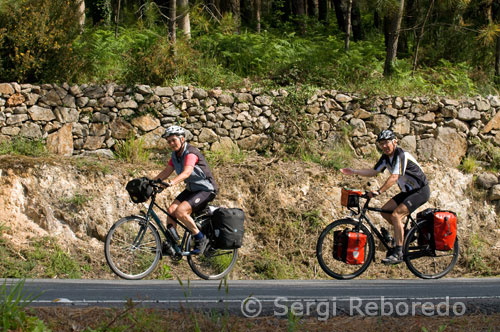 A couple made the Camino de Santiago by bike. Outskirts of Santiago.