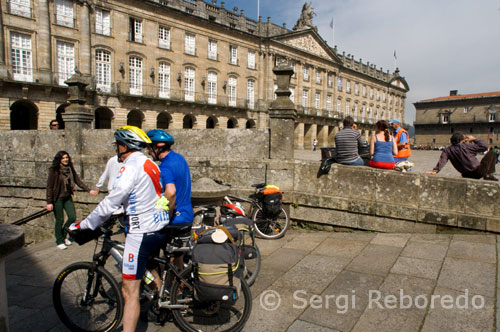  Cyclists in the square do Obradoiro. Santiago de Compostela. 