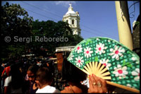 A woman with her range in the output of mass. Cathedral of Saint Paul. Vigan. Ilocos.