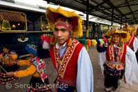 Musicians and dancers in costumes typical hosts entry in the Hiram Bingham train Orient Express which runs between Cuzco and Machu Picchu. PERU