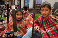 Children dressed in traditional costume in Pisac Sunday market day. Pisac. Sacred Valley. PERU DRESSED
