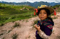 A girl in the archaeological site of Moray in the Sacred Valley near Cuzco.