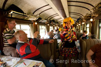 Inside the train. Musicians and costumed dancers liven up the typical journey of the Andean Explorer train Orient Express which runs between Cuzco and Puno.
